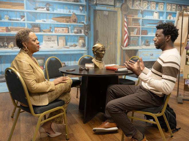 National Geographic Explorer Clinton Johnson talks with Linda Harris at the Harriet Tubman Museum